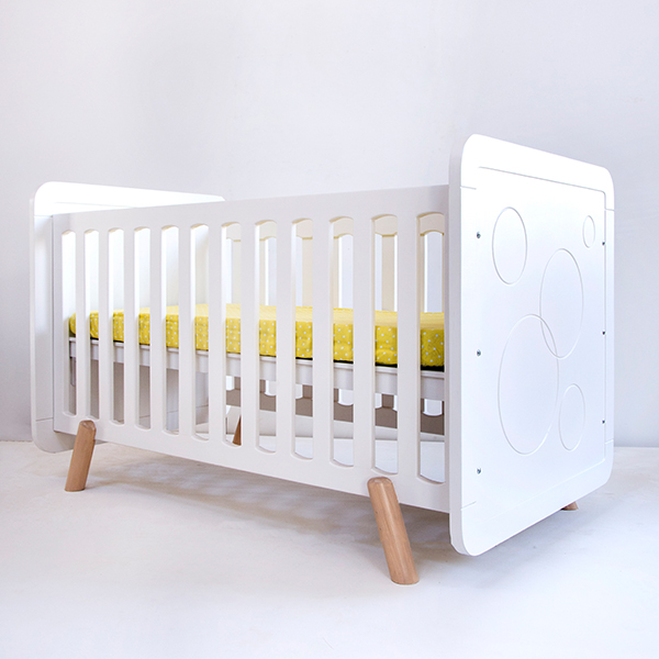 Spherical convertible cot